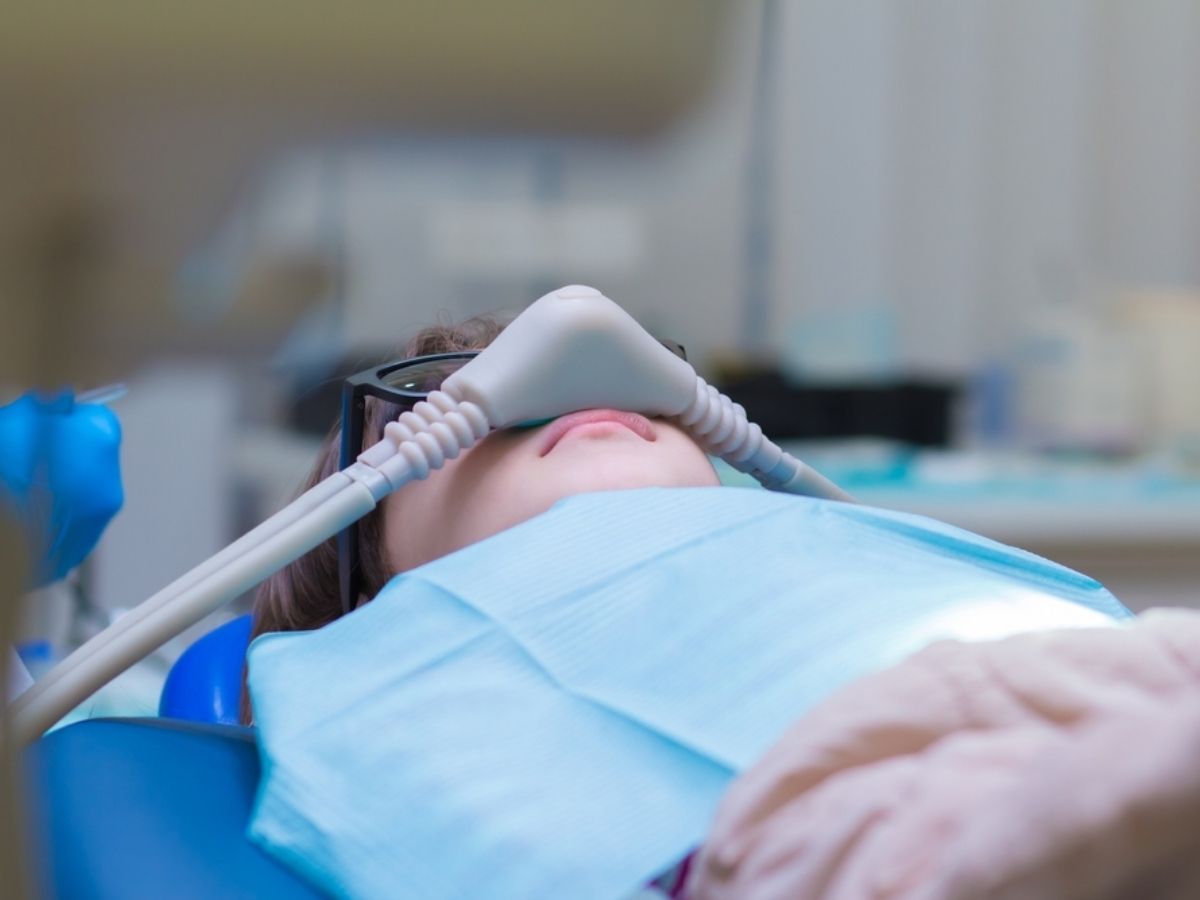 Dentistry.,Little,Girl,Getting,Inhalation,Sedation,While,Teeth,Treatment,At