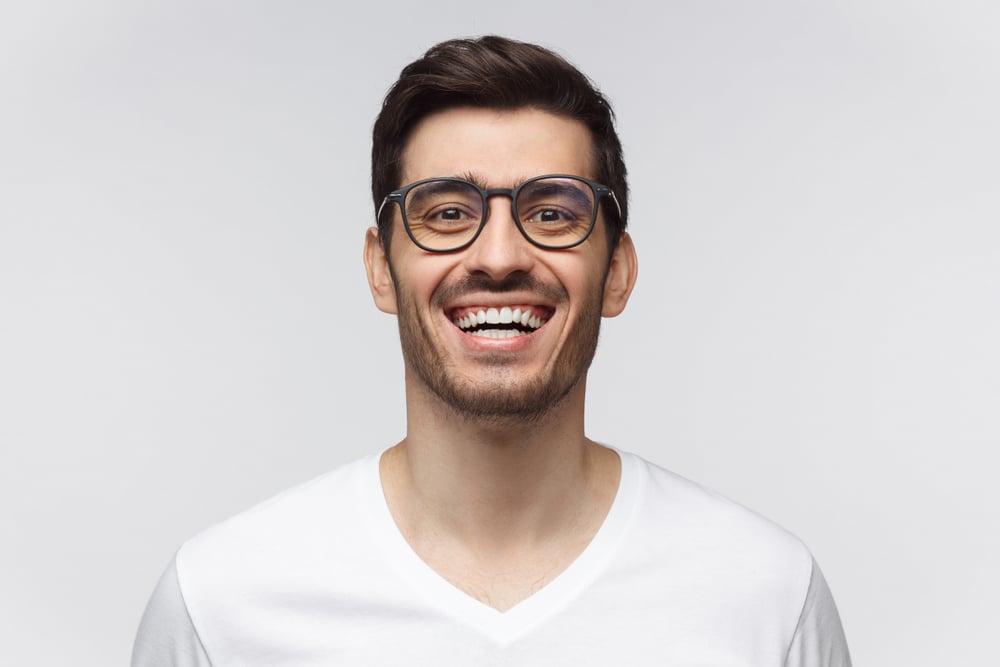 Laughing,Out,Loud.,Joyful,Young,Man,In,Casual,T-shirt,Smiles