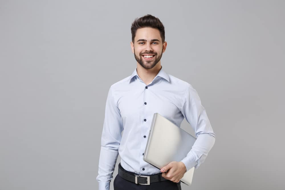 Smiling,Young,Unshaven,Business,Man,In,Light,Shirt,Posing,Isolated