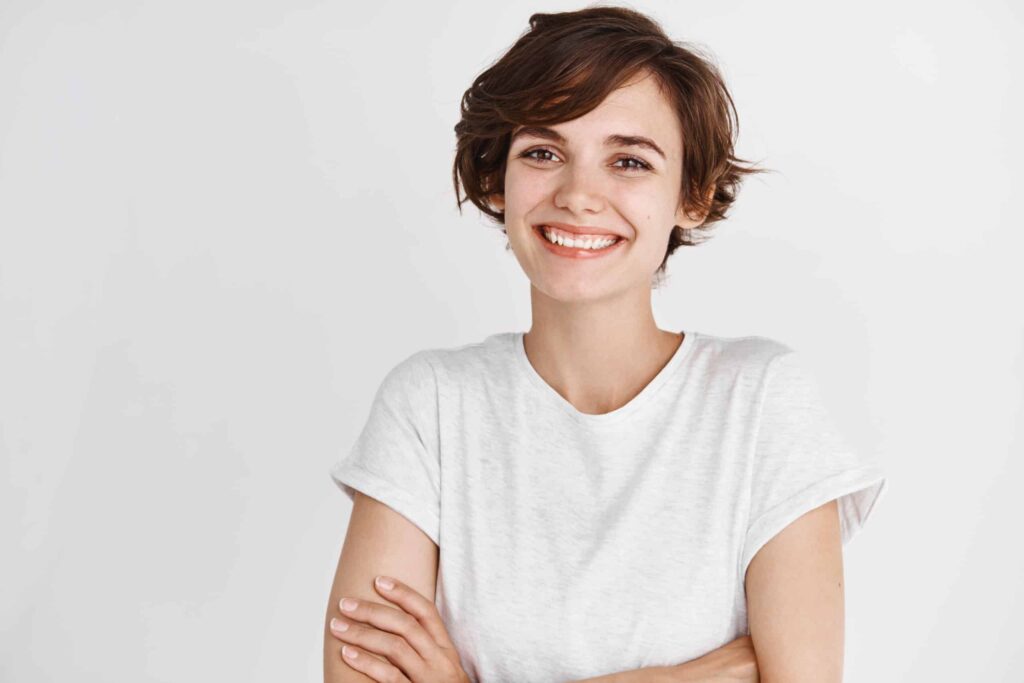 Close-up,Of,Happy,Professional,Girl,Cross,Arms,On,Chest,,Smiling