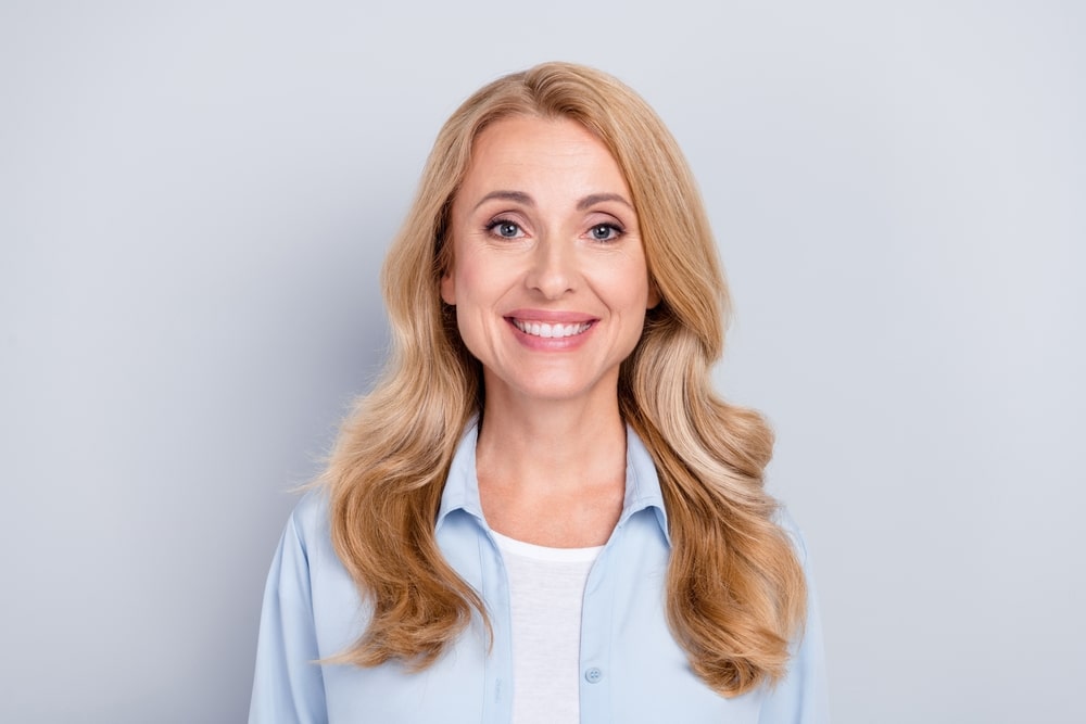 Photo,Of,Smiling,Cheerful,Mature,Woman,Smiling,Stomatology,Treatment,New