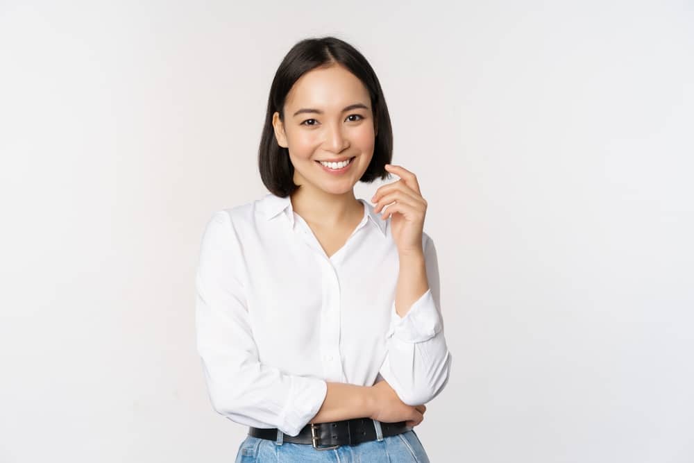 Young,Asian,Woman,,Professional,Entrepreneur,Standing,In,Office,Clothing,,Smiling